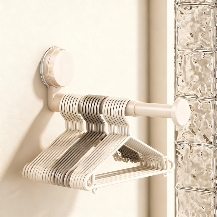 Telescopic clothes rail with suction cup