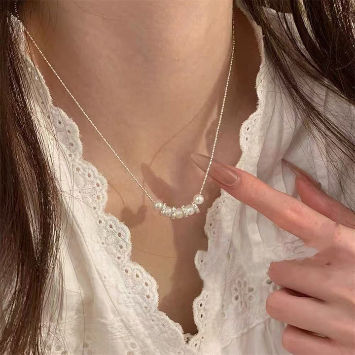 Pearl necklace with silver clasp, pearls 4–12 mm