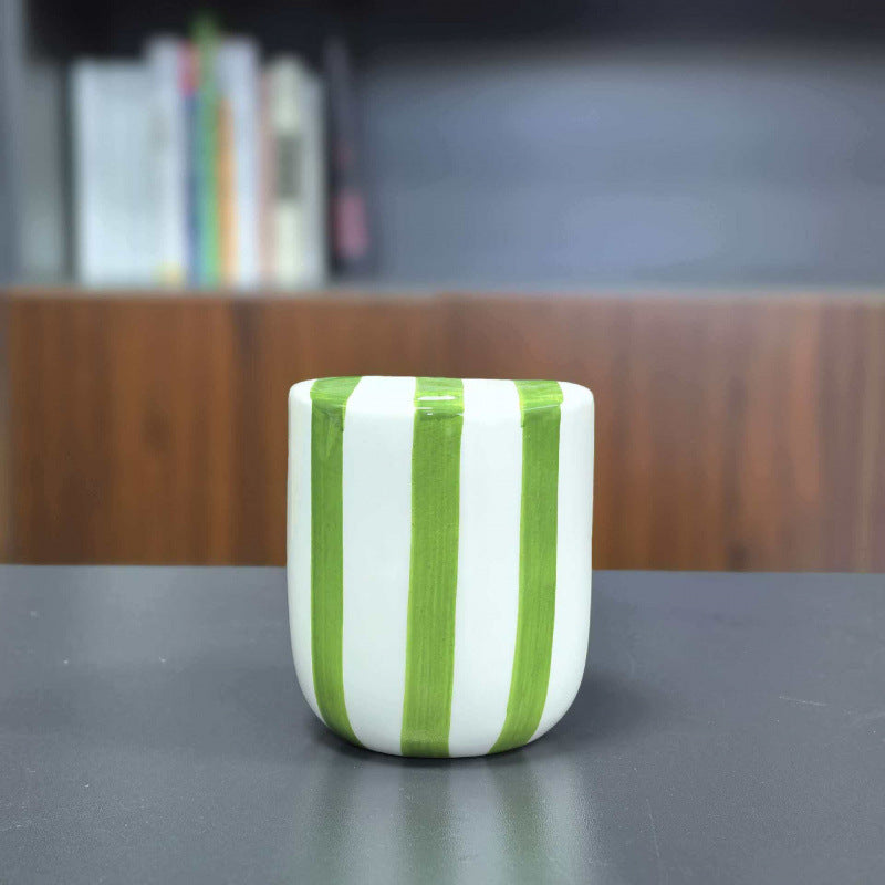 Ceramic coffee mug with hand-painted stripes