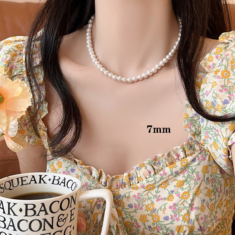 Pearl necklace with silver clasp, pearls 4–12 mm