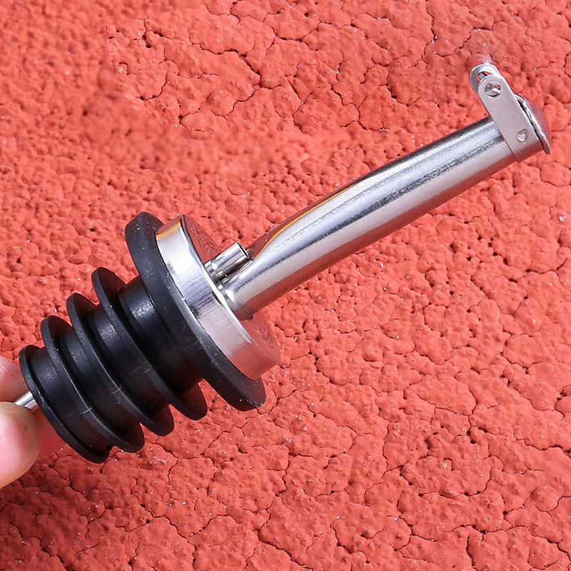 Stainless steel spout with automatic closure