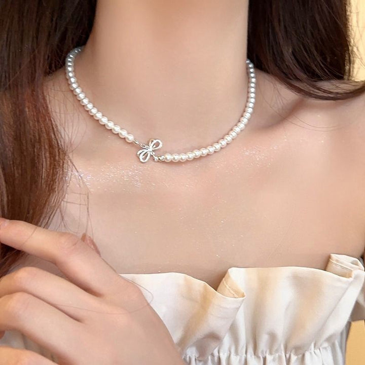 Pearl necklace with silver clasp, pearls 4–12 mm