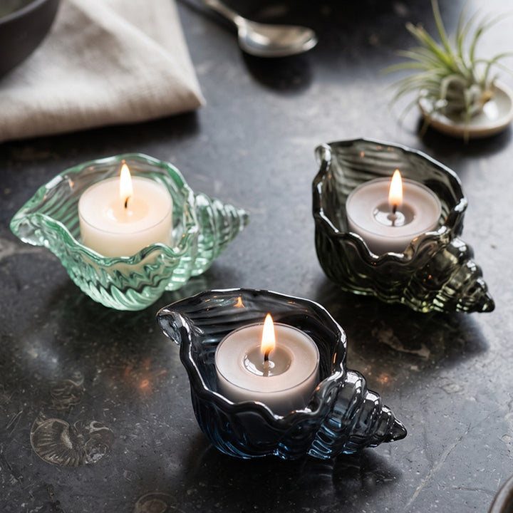 Shell-shaped glass candle holder in color