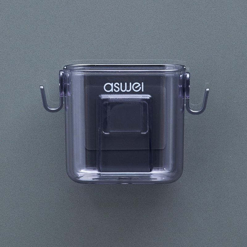 Wall-mounted storage box for remote controls and phones