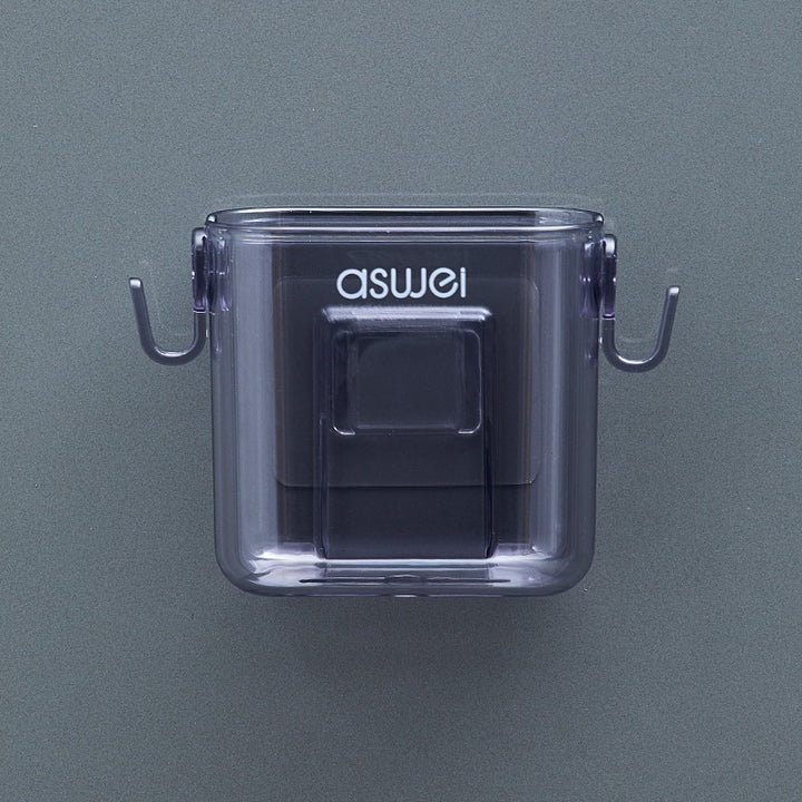 Wall-mounted storage box for remote controls and phones