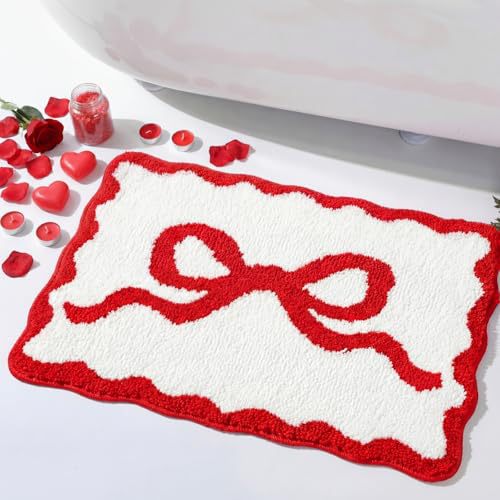 Bath mat with bow motif, synthetic fiber fabric