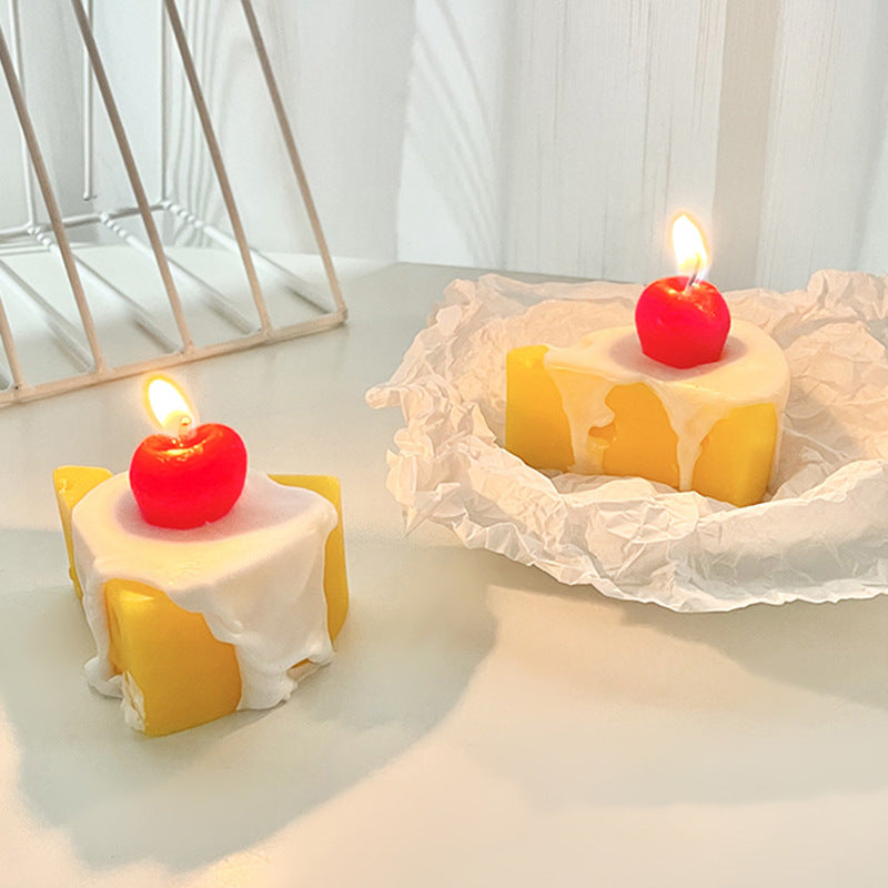 Handcrafted scented candle in cheese shape