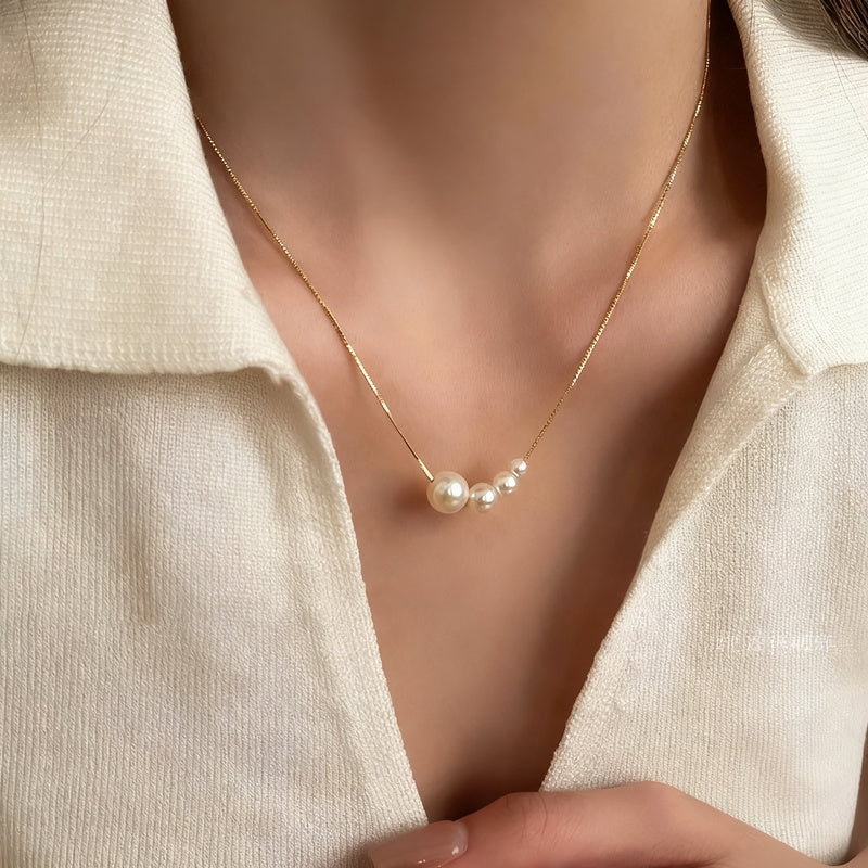 Pearl necklace with silver clasp, pearls 4–12 mm