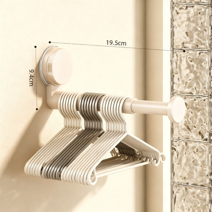 Telescopic clothes rail with suction cup