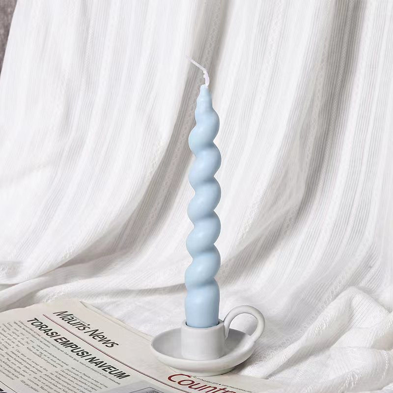 Spiral-shaped decorative candle made of soy wax