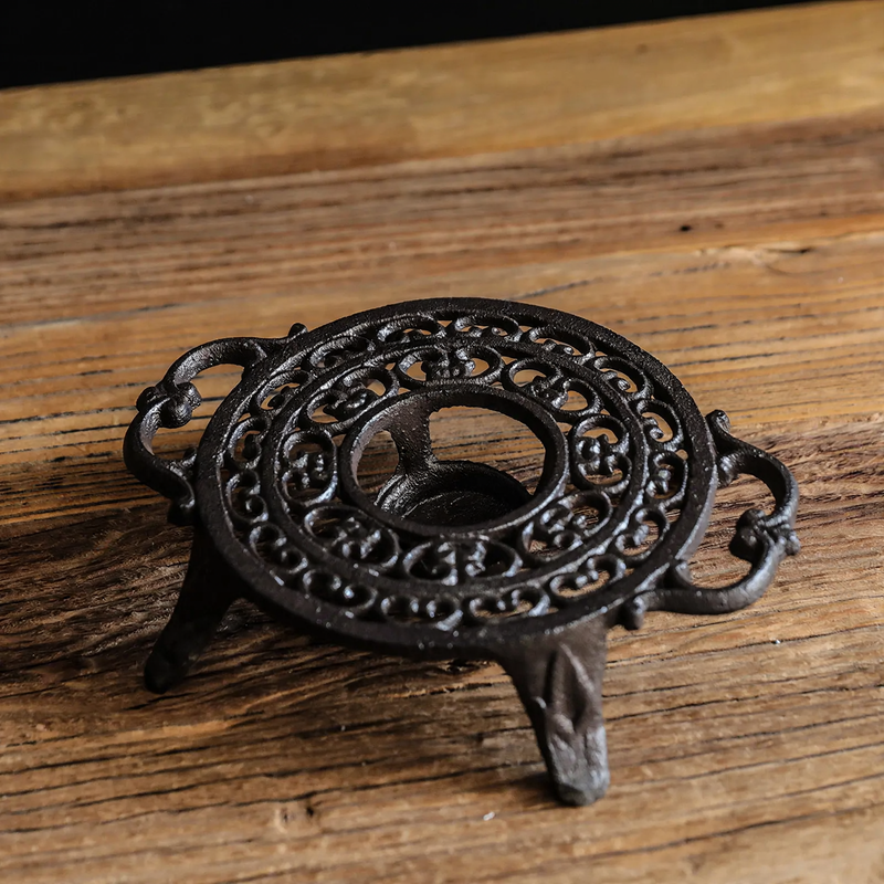 Cast iron tea warmer with burner stand