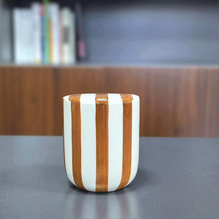 Ceramic coffee mug with hand-painted stripes