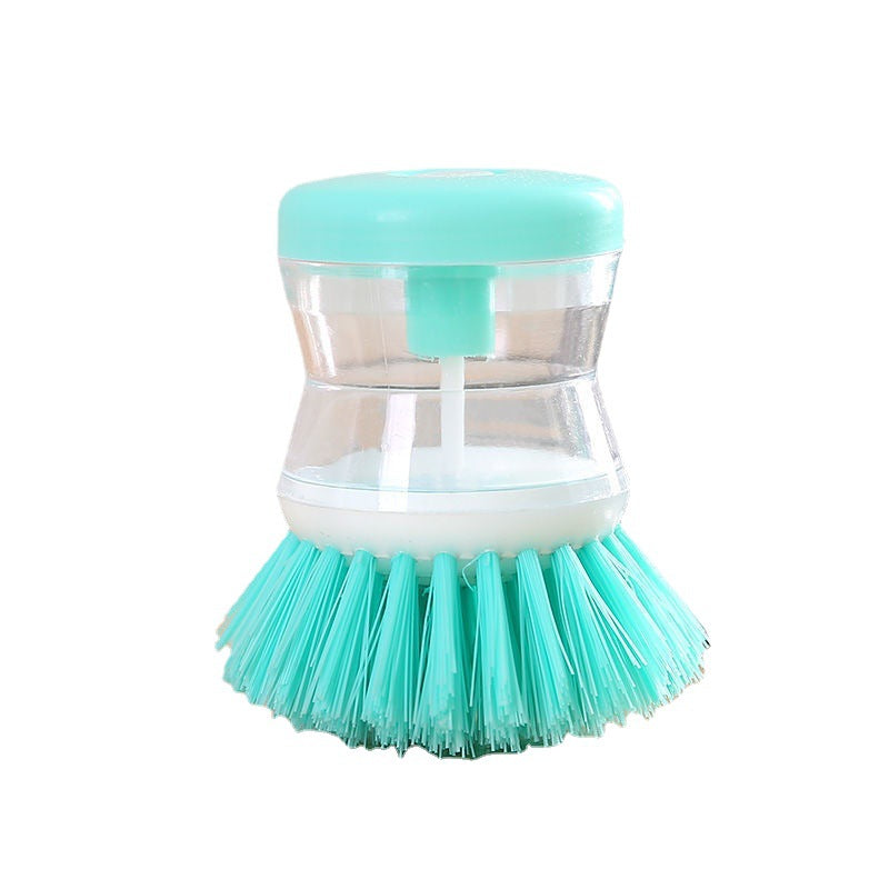 Dish brush with soap dispenser for pressing