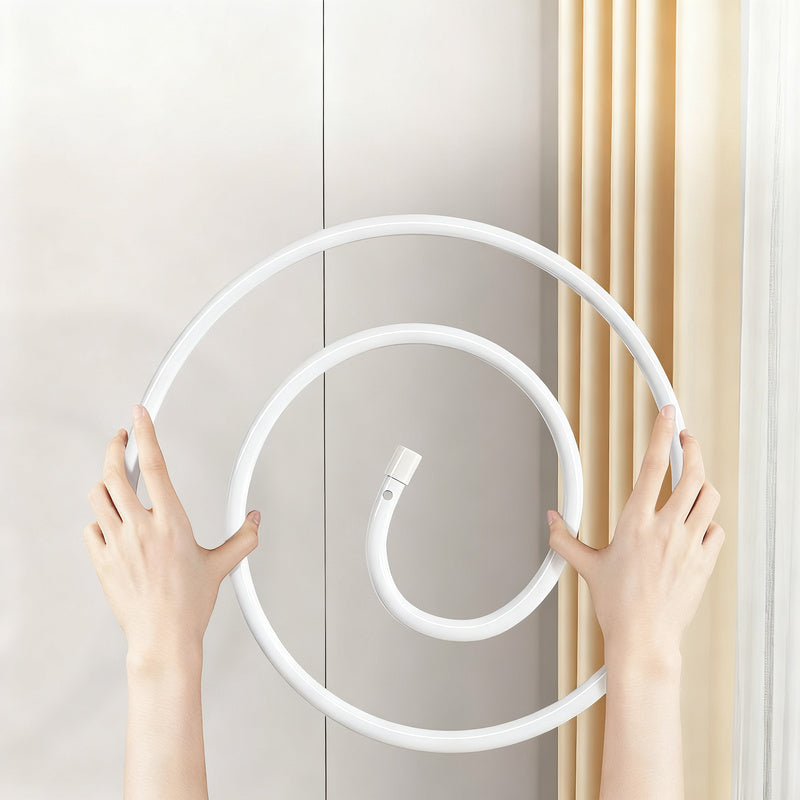 Clothes dryer spiral-shaped, round or oval