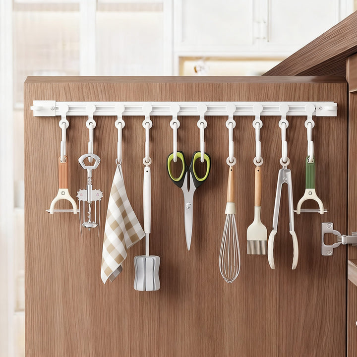 Track system with hooks for cabinet doors