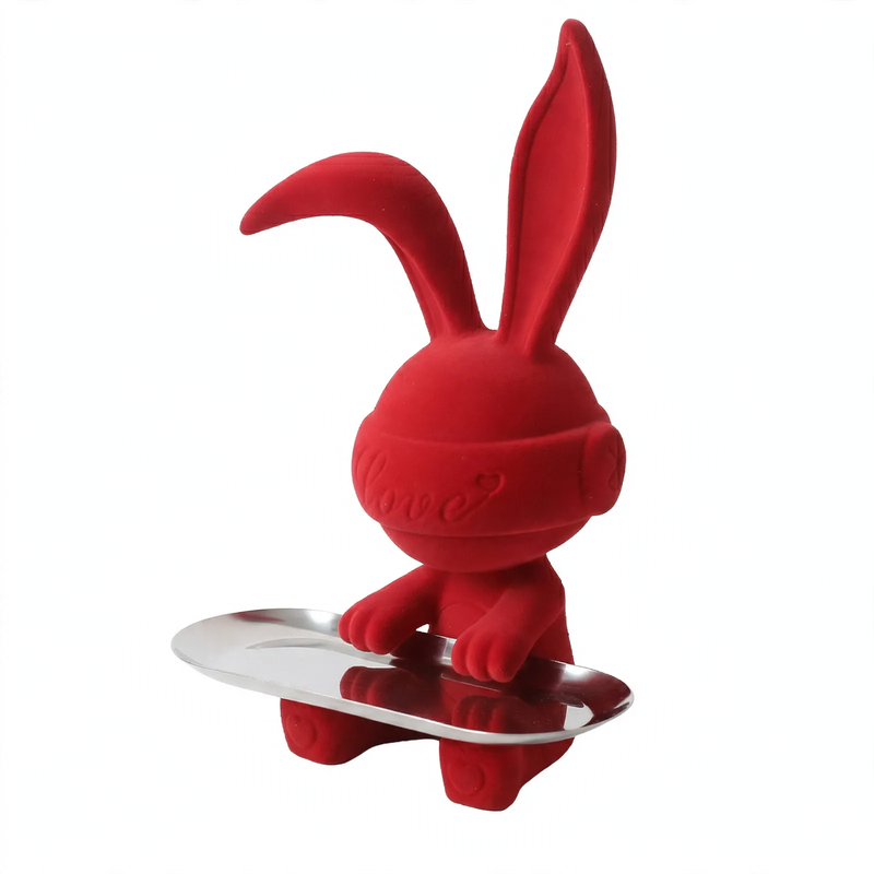 Modern decorative figure made of resin with velvet surface