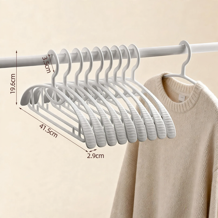 Plastic clothes hanger with anti-slip protection