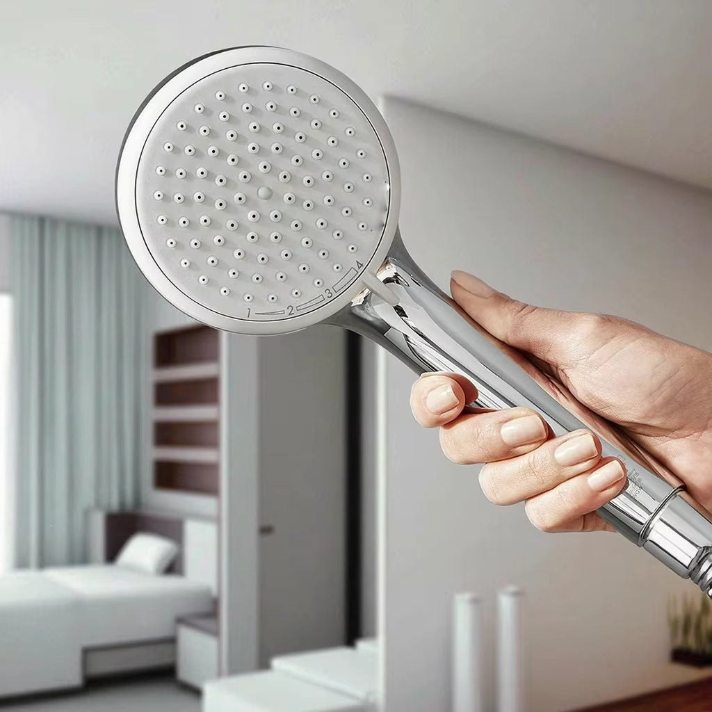 Faucet attachment with shower head and filtration