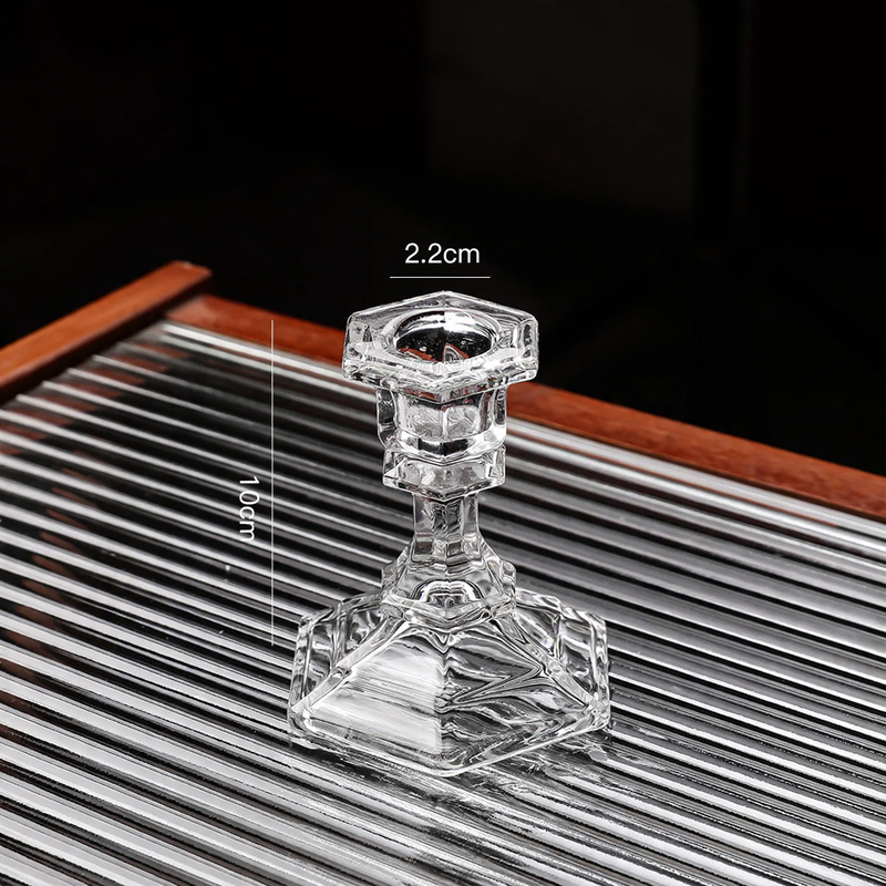 Glass candle holders in various shapes