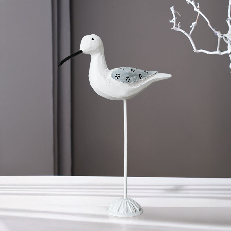 Wood bird figure in Mediterranean style