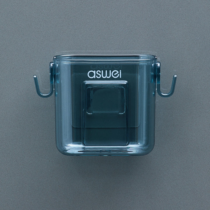 Wall-mounted storage box for remote controls and phones