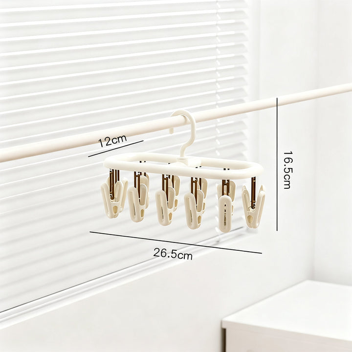 Clothes drying rack with multiple clips for hanging