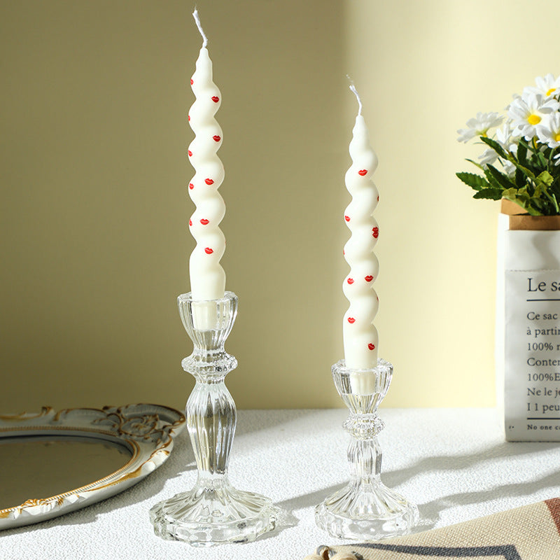 Transparent glass candle holder with structured pattern
