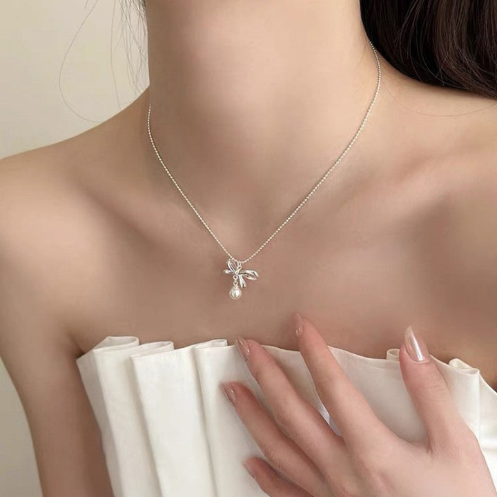 Pearl necklace with silver clasp, pearls 4–12 mm