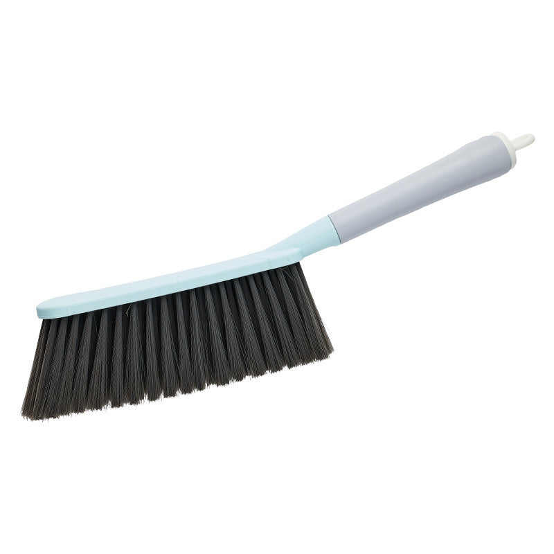 Bed brush with long handle, soft bristles