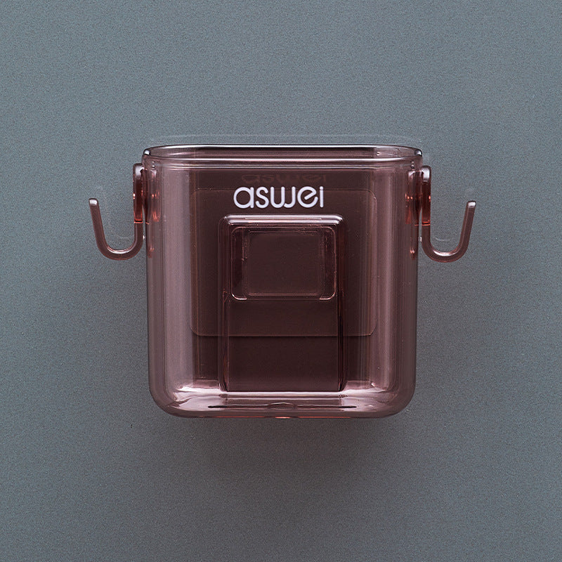Wall-mounted storage box for remote controls and phones