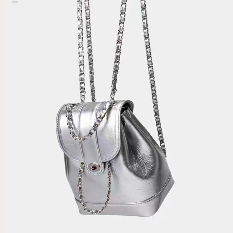 Compact backpack made of PU with chain decoration