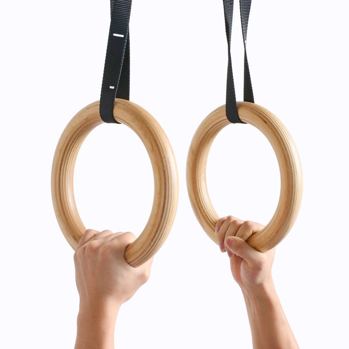 Wooden gymnastics rings with strap