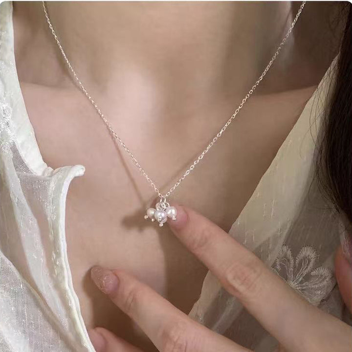 Pearl necklace with silver clasp, pearls 4–12 mm
