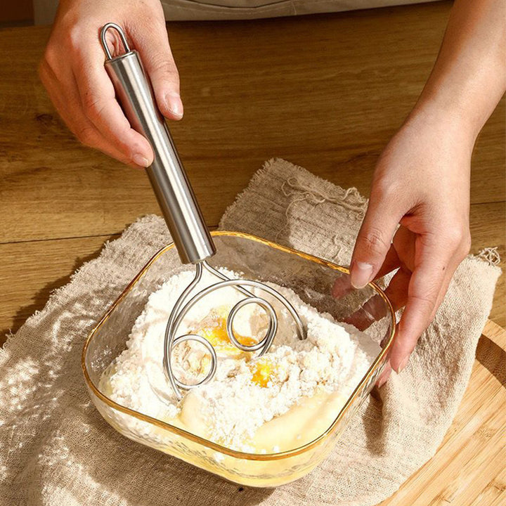 Stainless steel whisk for stirring and beating