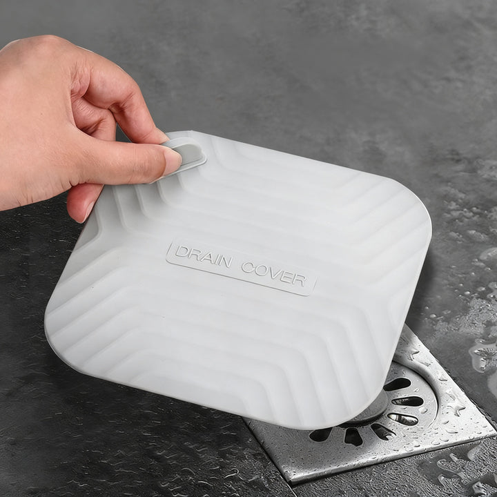 Silicone floor drain seal, odor-reducing