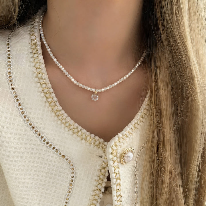 Pearl necklace with silver clasp, pearls 4–12 mm