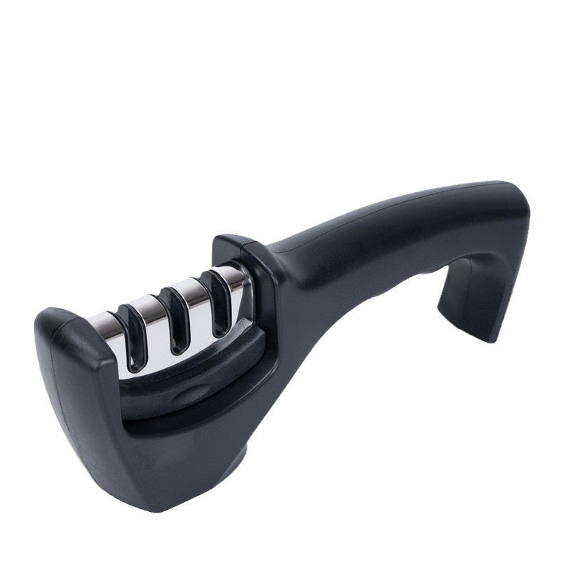 Knife sharpener with removable sharpening stone