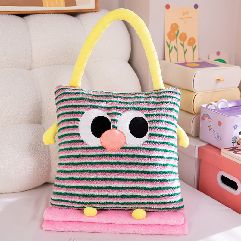 Cuddle cushion and blanket 2-in-1, striped pattern