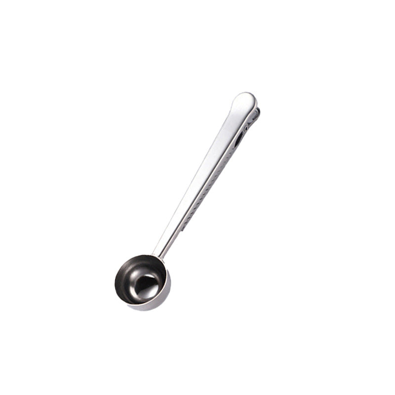Stainless steel measuring spoons with closure clip