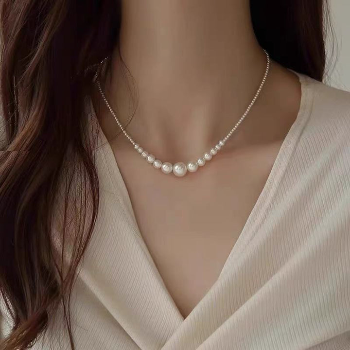 Pearl necklace with silver clasp, pearls 4–12 mm