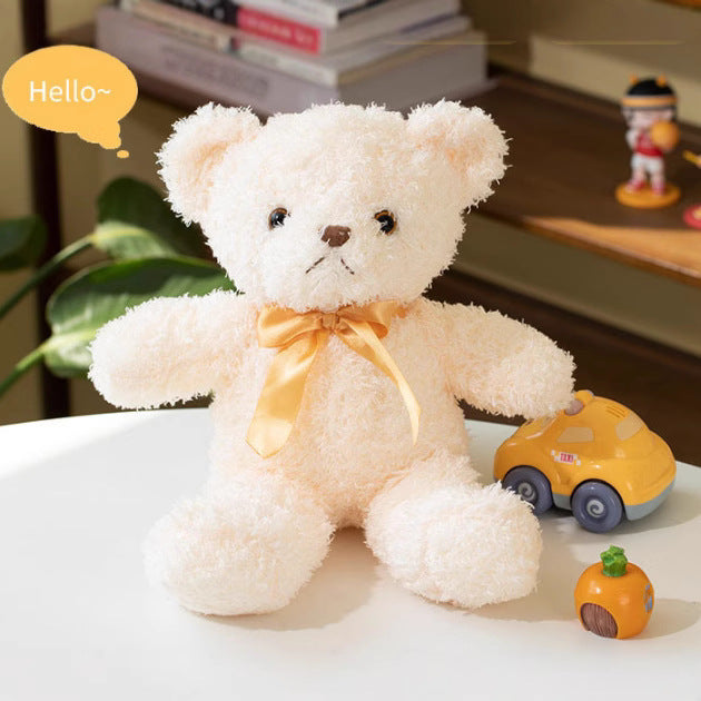 Plush teddy bear with bow, 25–30 cm