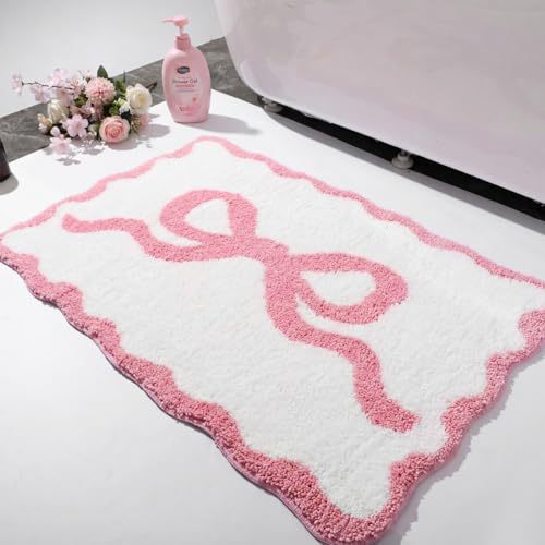 Bath mat with bow motif, synthetic fiber fabric
