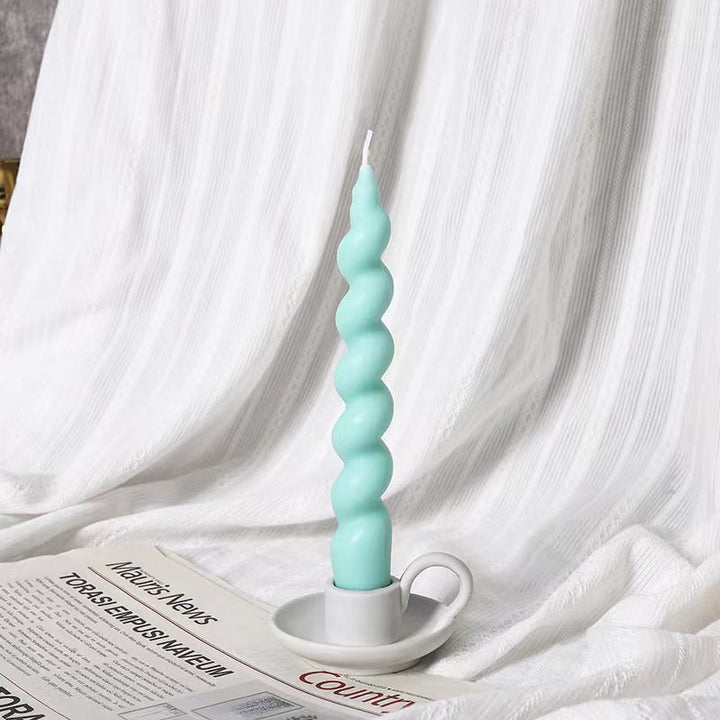 Spiral-shaped decorative candle made of soy wax