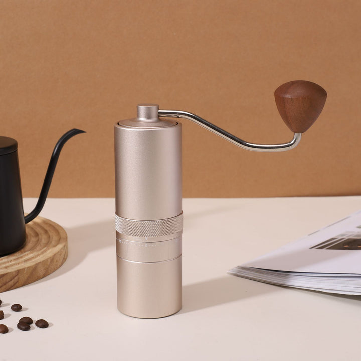 Hand coffee grinder with CNC grinding mechanism and brush