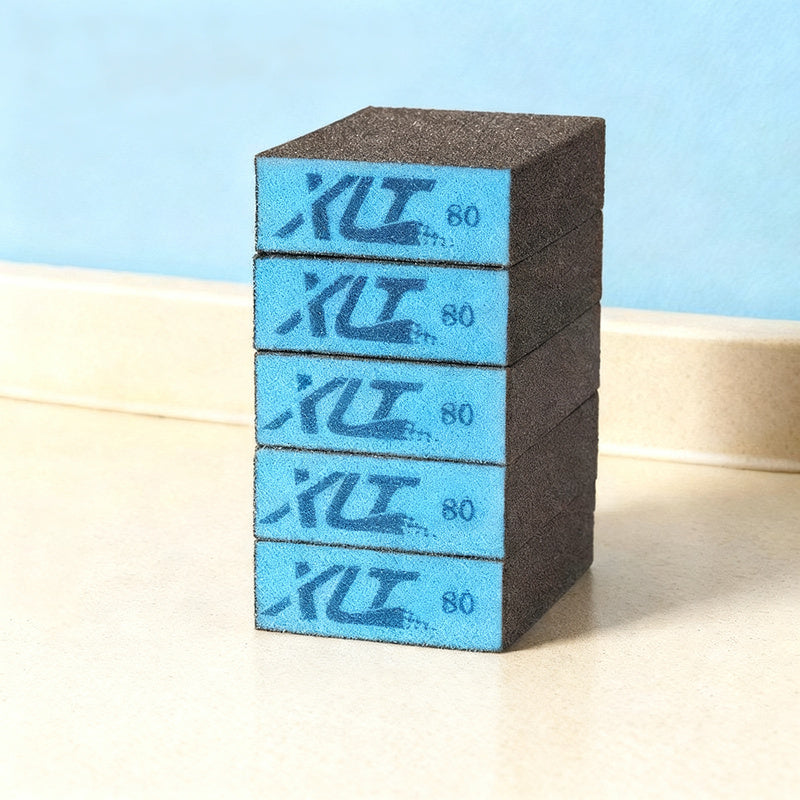 Abrasive sponge with grain for pots and pans