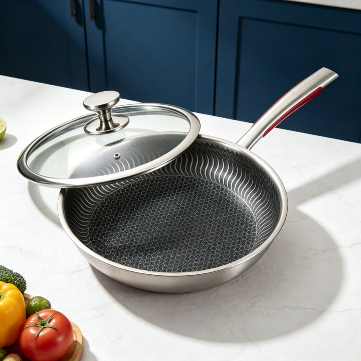 Stainless steel frying pan with glass lid
