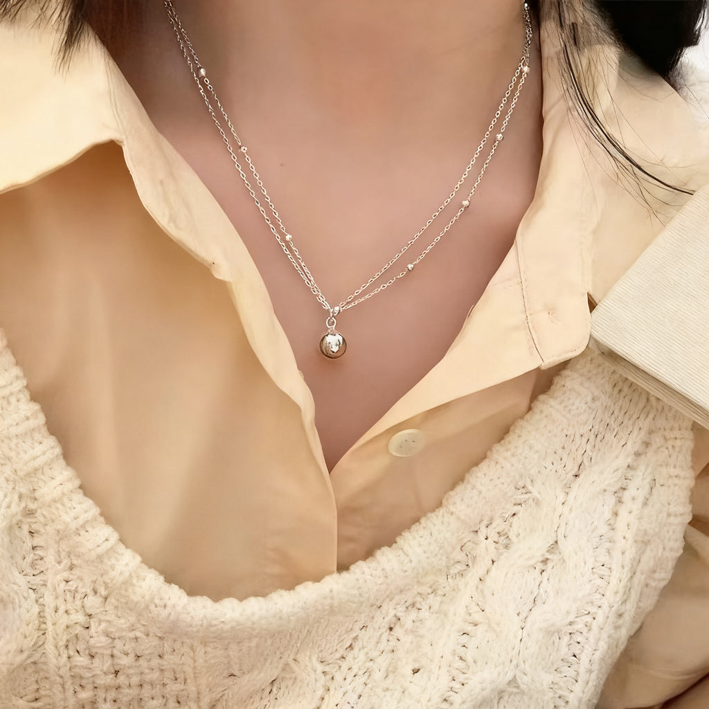 Pearl necklace with silver clasp, pearls 4–12 mm