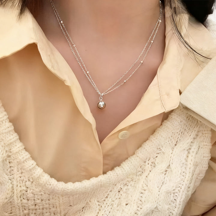 Pearl necklace with silver clasp, pearls 4–12 mm
