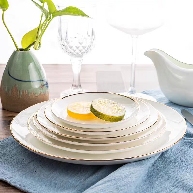 Porcelain dinnerware with gold rim, 25-piece