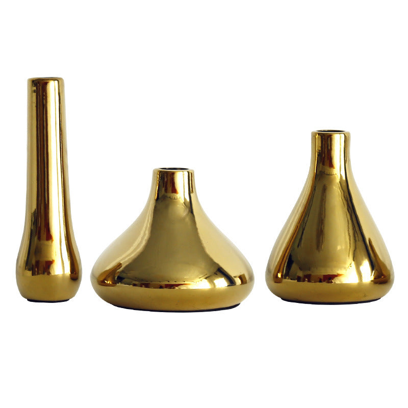 Ceramic flower vase with gold finish, geometric